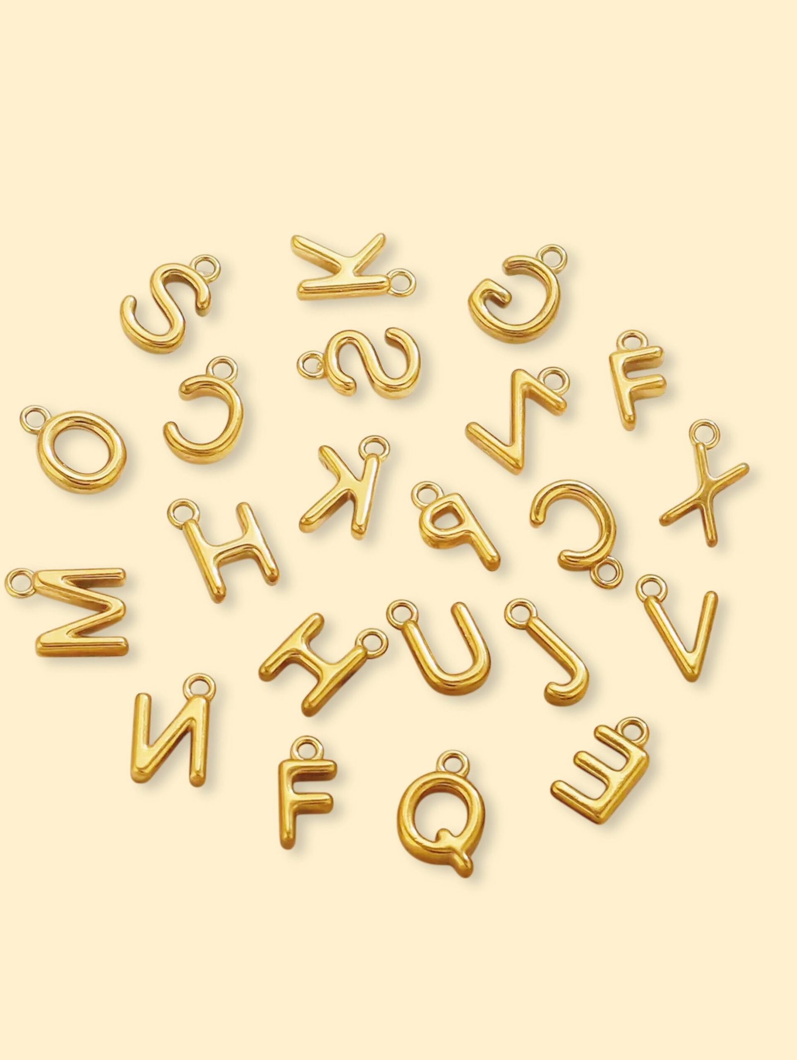 27347314-8C74-4FE2-97C5-7A48801C2608-1 Alphabet Charm Pendant 18K Gold Plated Stainless Steel - Image 1